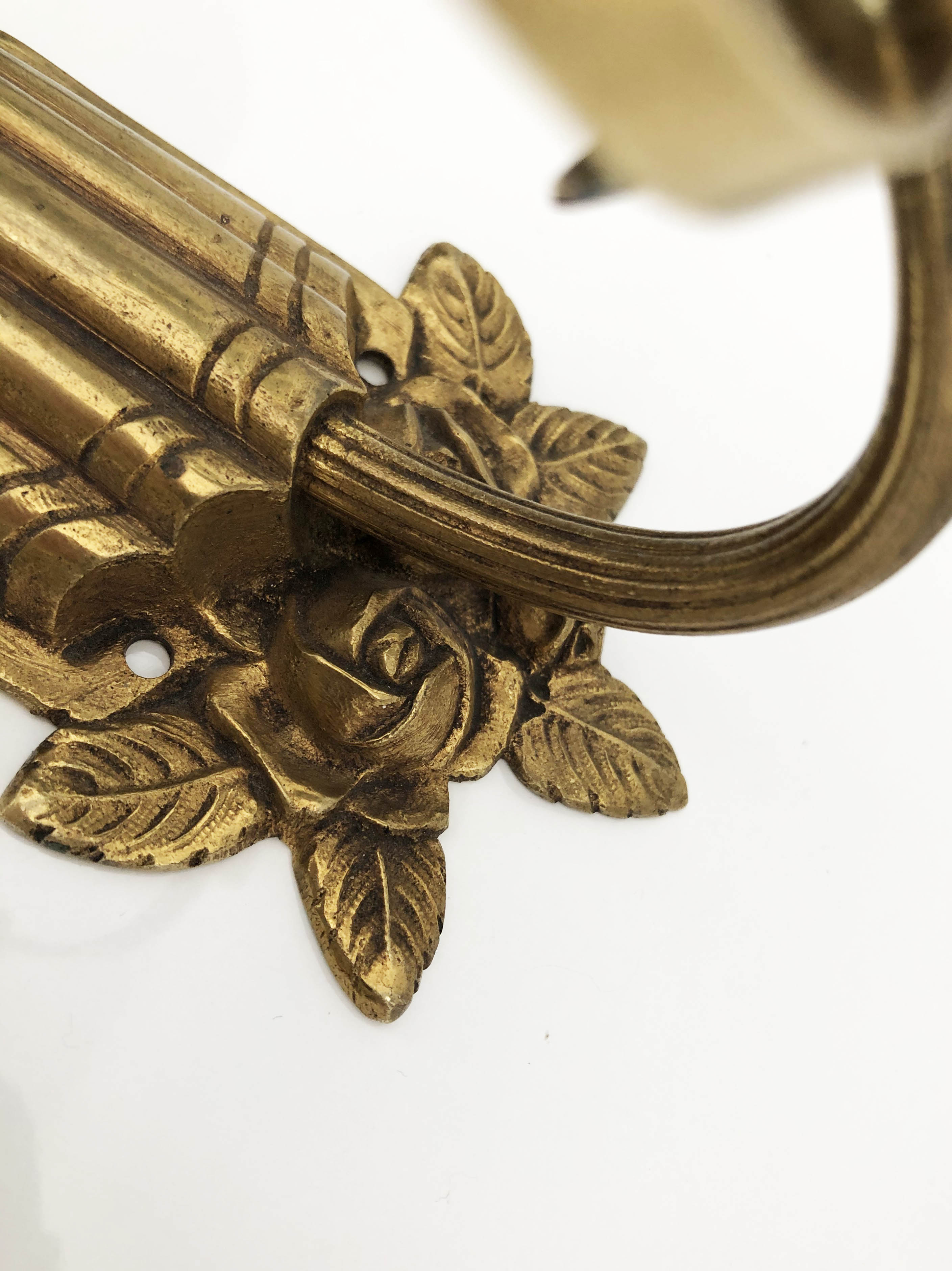 Ancient bronze and opalescent glass sconce