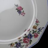 4 flat plates by Bernardaud, Limoges porcelain, floral decoration from the 1920s to 1950s.