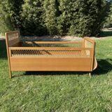 Scandinavian rattan bed from the 70s for children