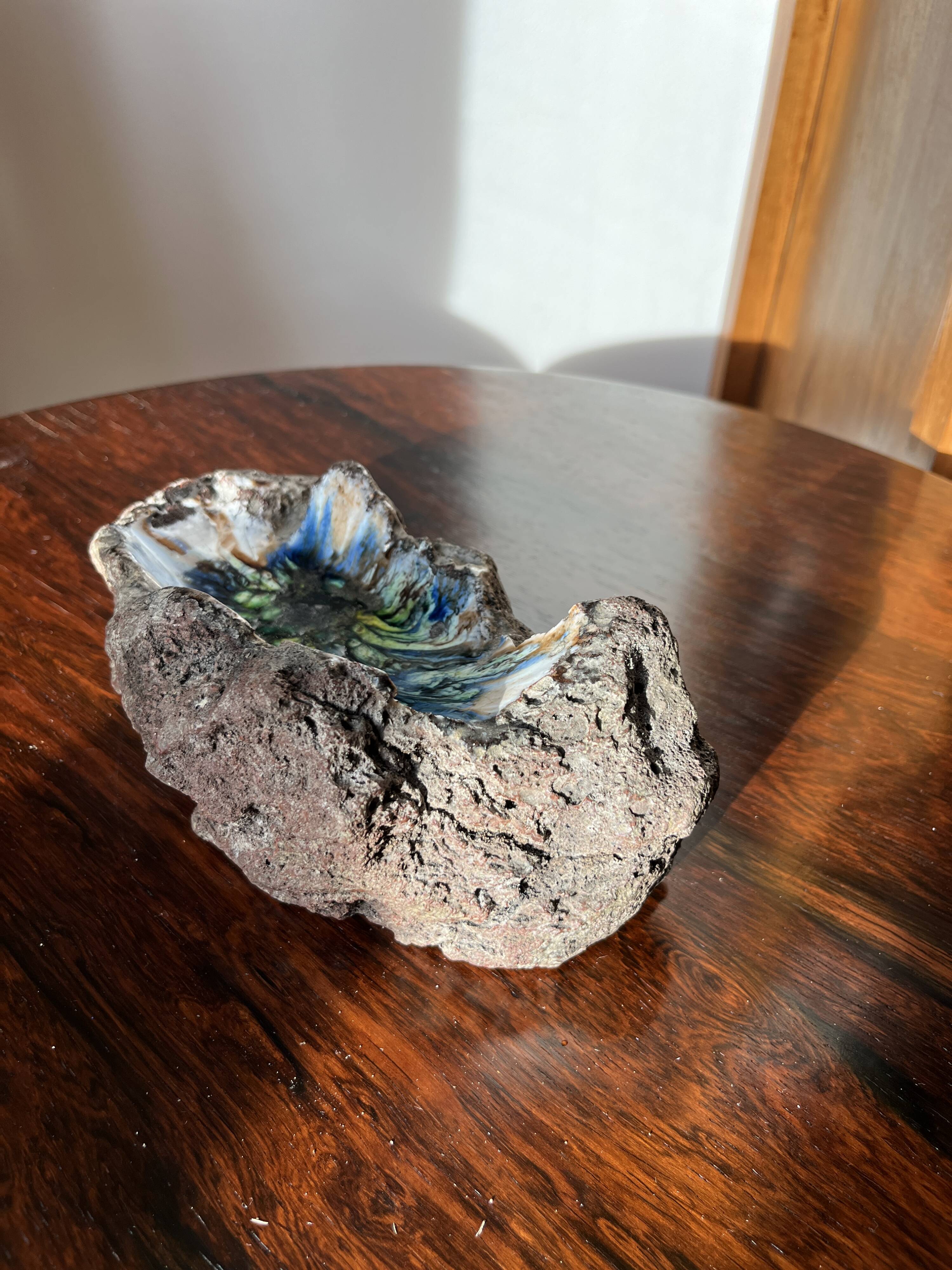 Colorful ceramic ashtray from 1950 on lava