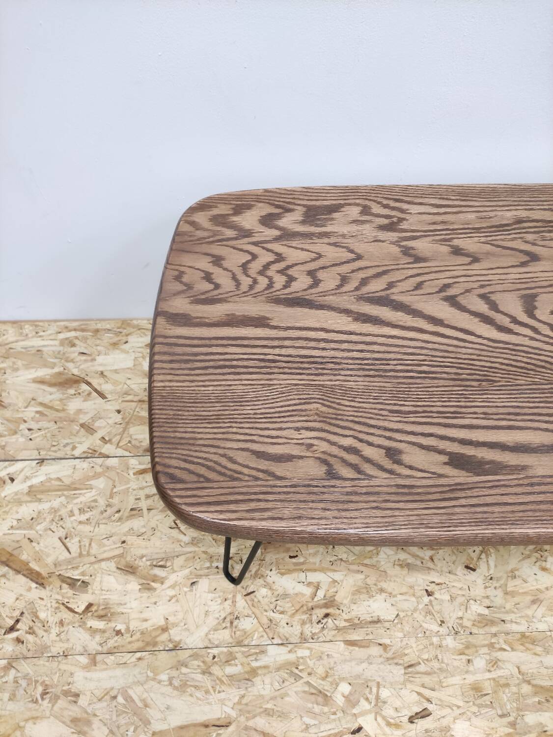 Solid oak oval coffee table with steel pin legs
