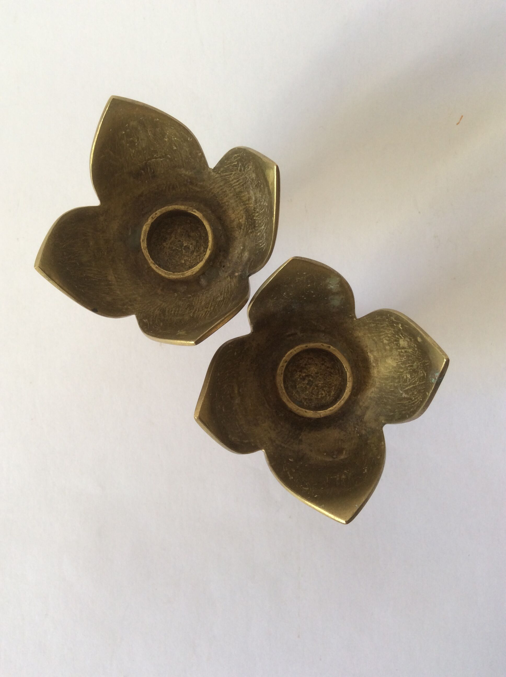 Pair of brass lotus flower candlesticks