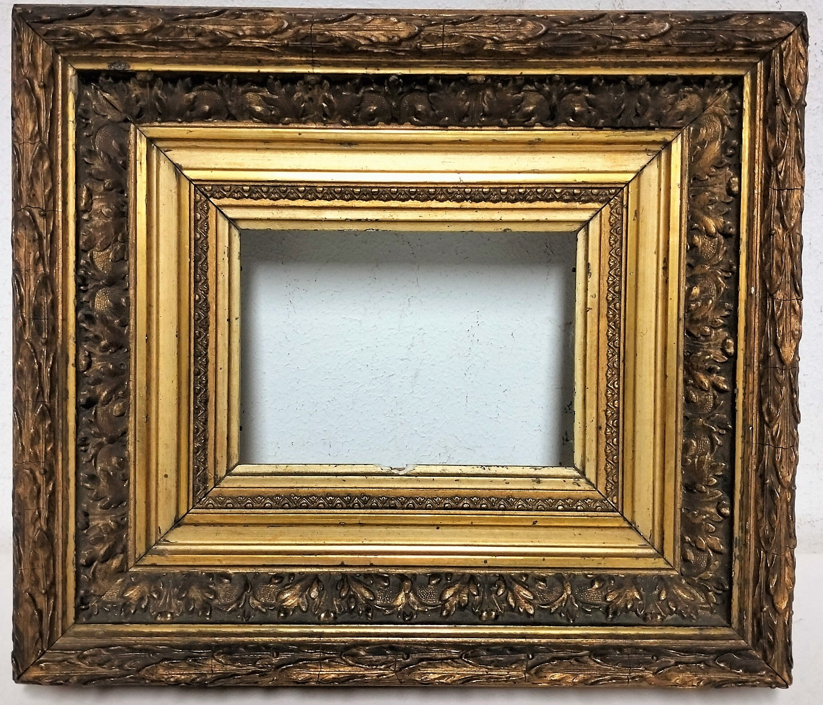 Frame wood and gilded stucco