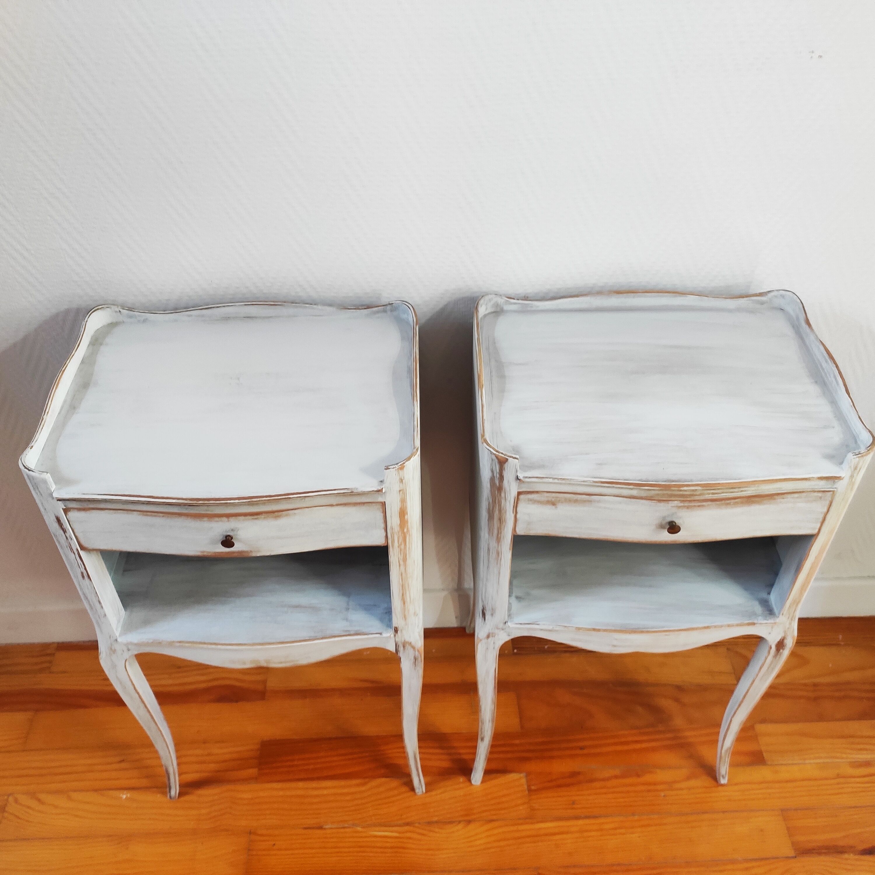 Pair of patinated bedside tables