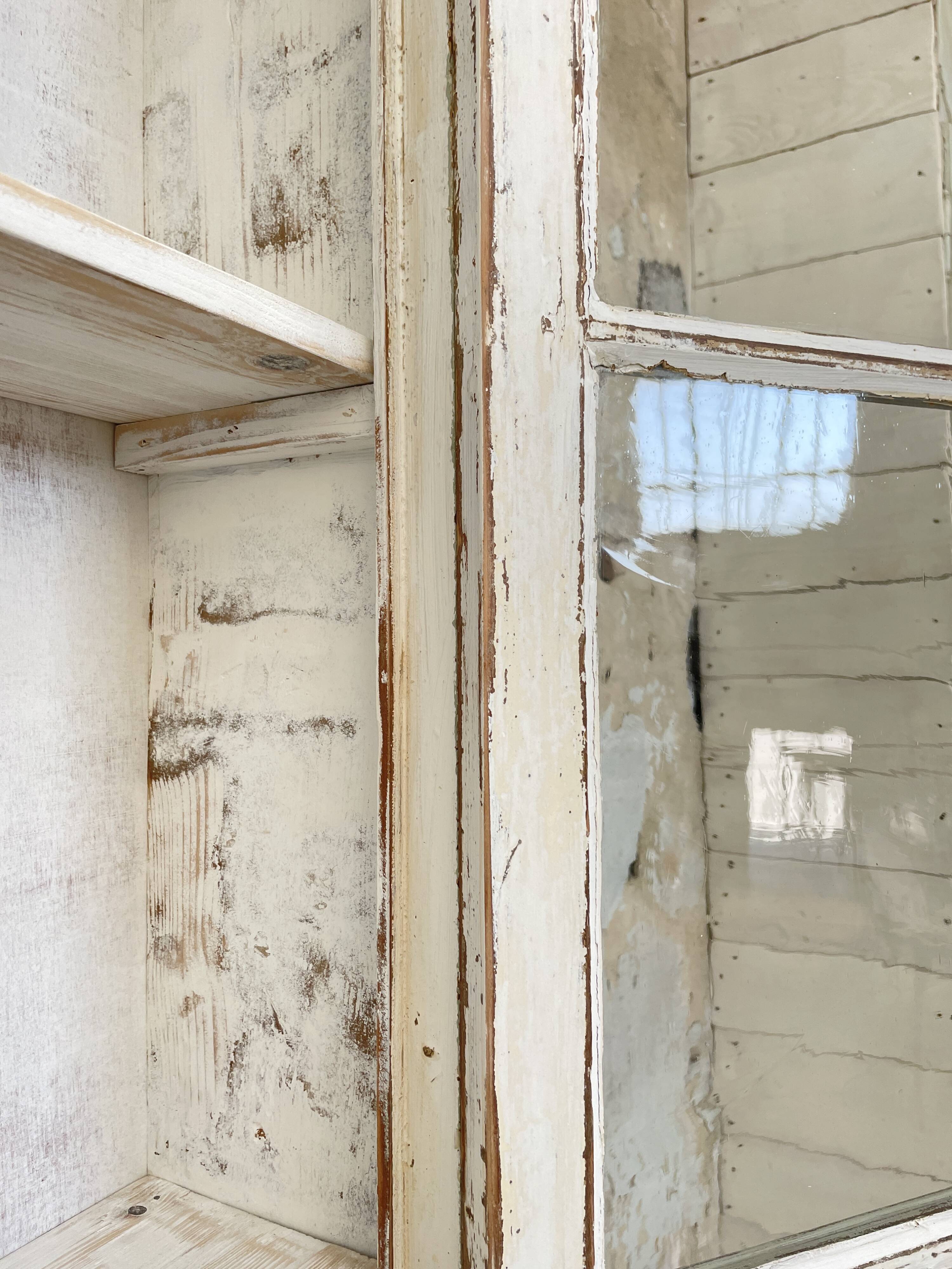 Furniture two body showcase, around 1900.