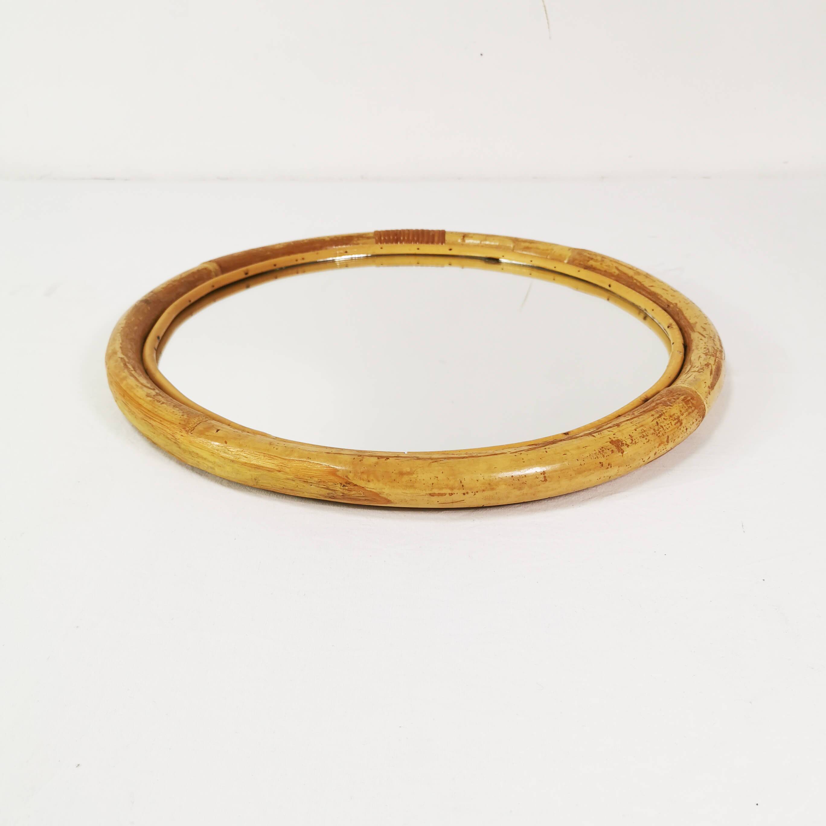 Wall-mounted, round bamboo mirror, Germany, 1970s.