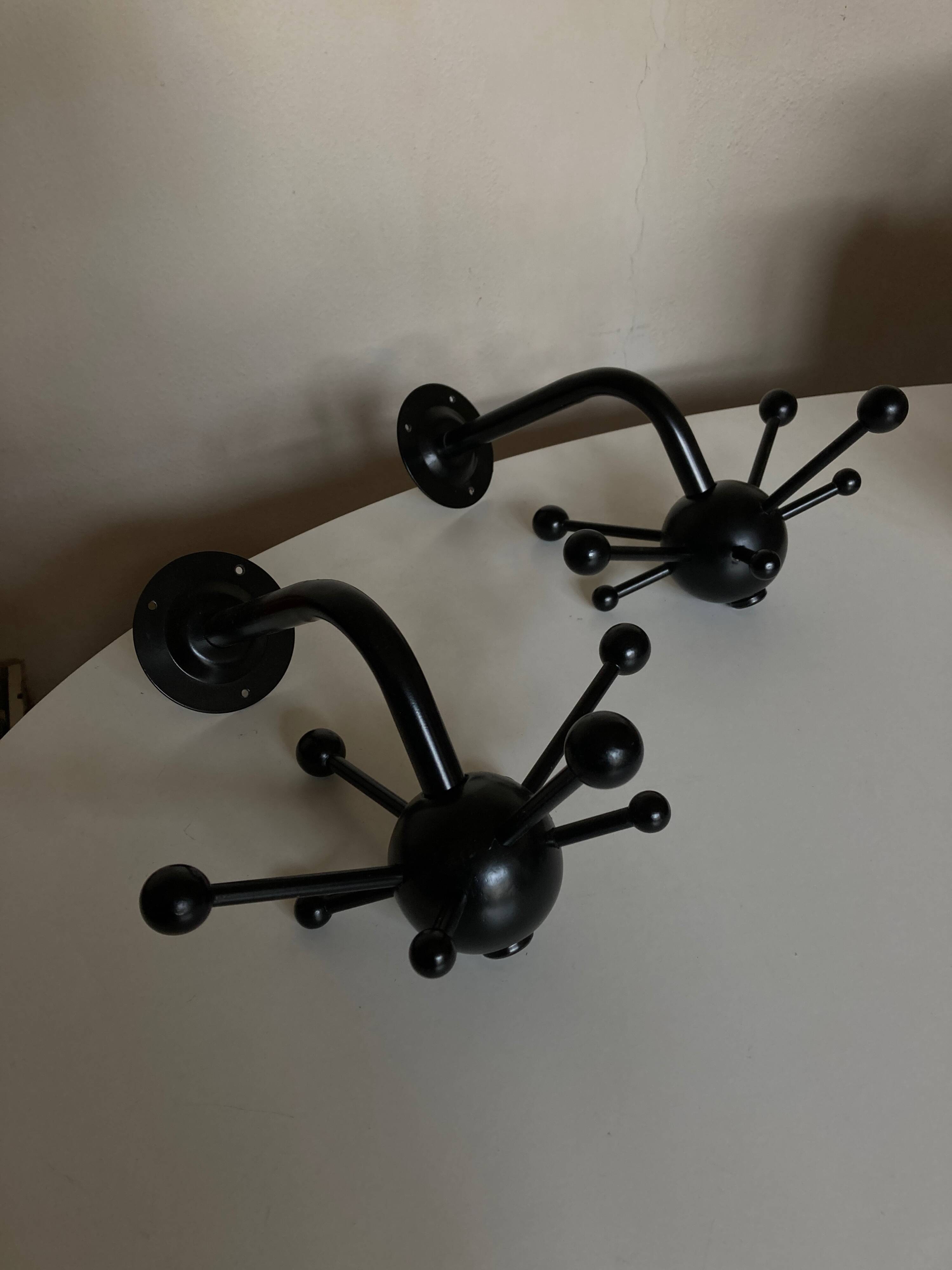 Pair of black space age sputnik coat racks