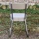 Set of 2 chairs and 1 armchair from the 70s in chrome metal and faux leather.