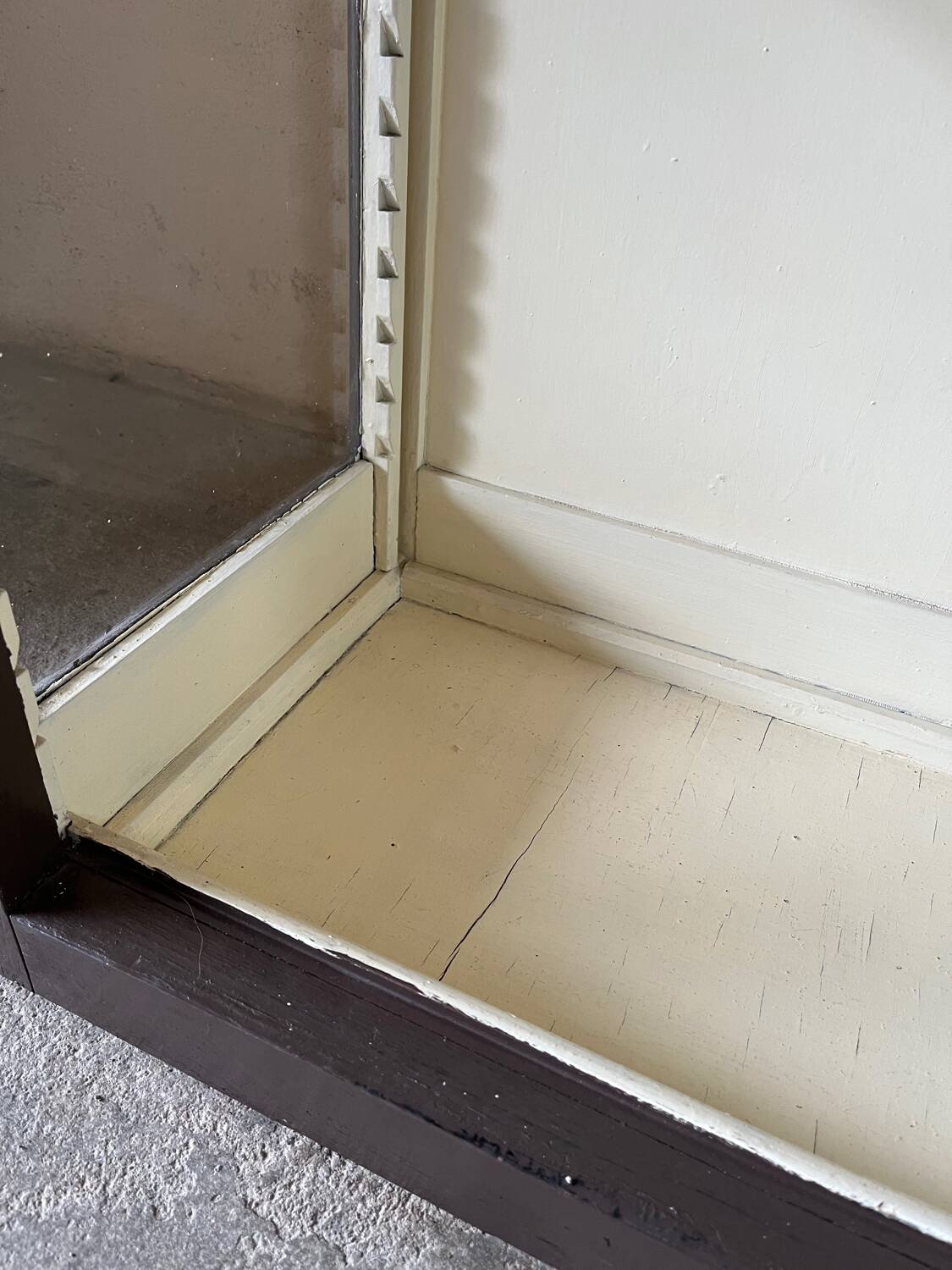 Old wooden glass display case