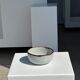 Small white glazed ceramic bowl black edges