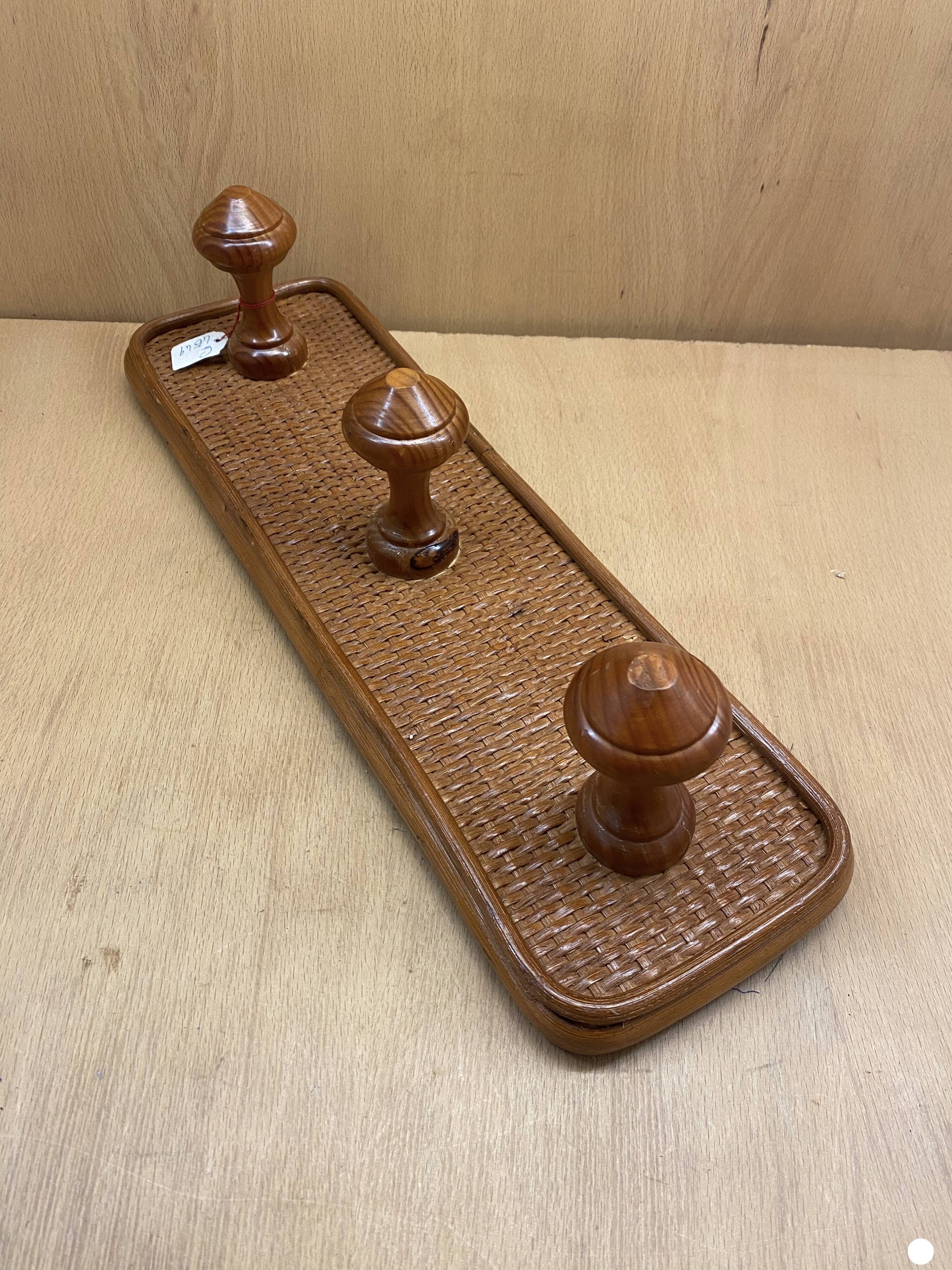 Triple coat rack in brown rattan