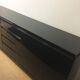 Wide row black lacquer and brass