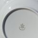 Twelve white porcelain plates