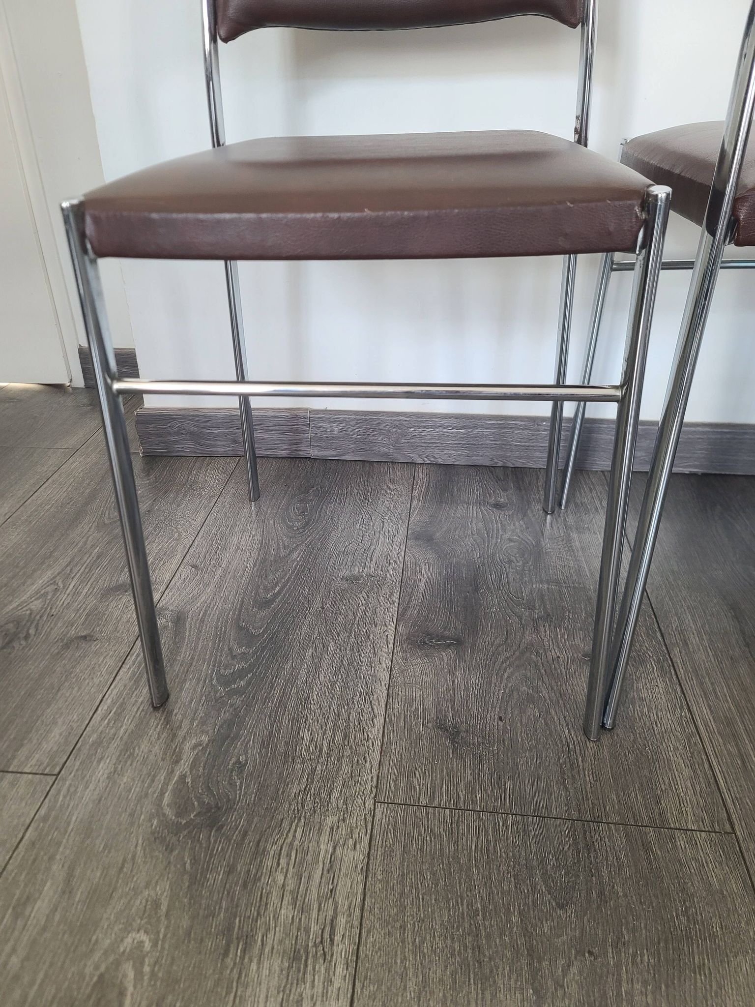 Set of 4 brown leatherette armchair chairs from the 1970s