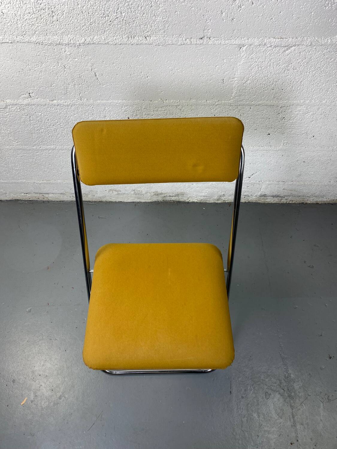 Mustard yellow folding chair