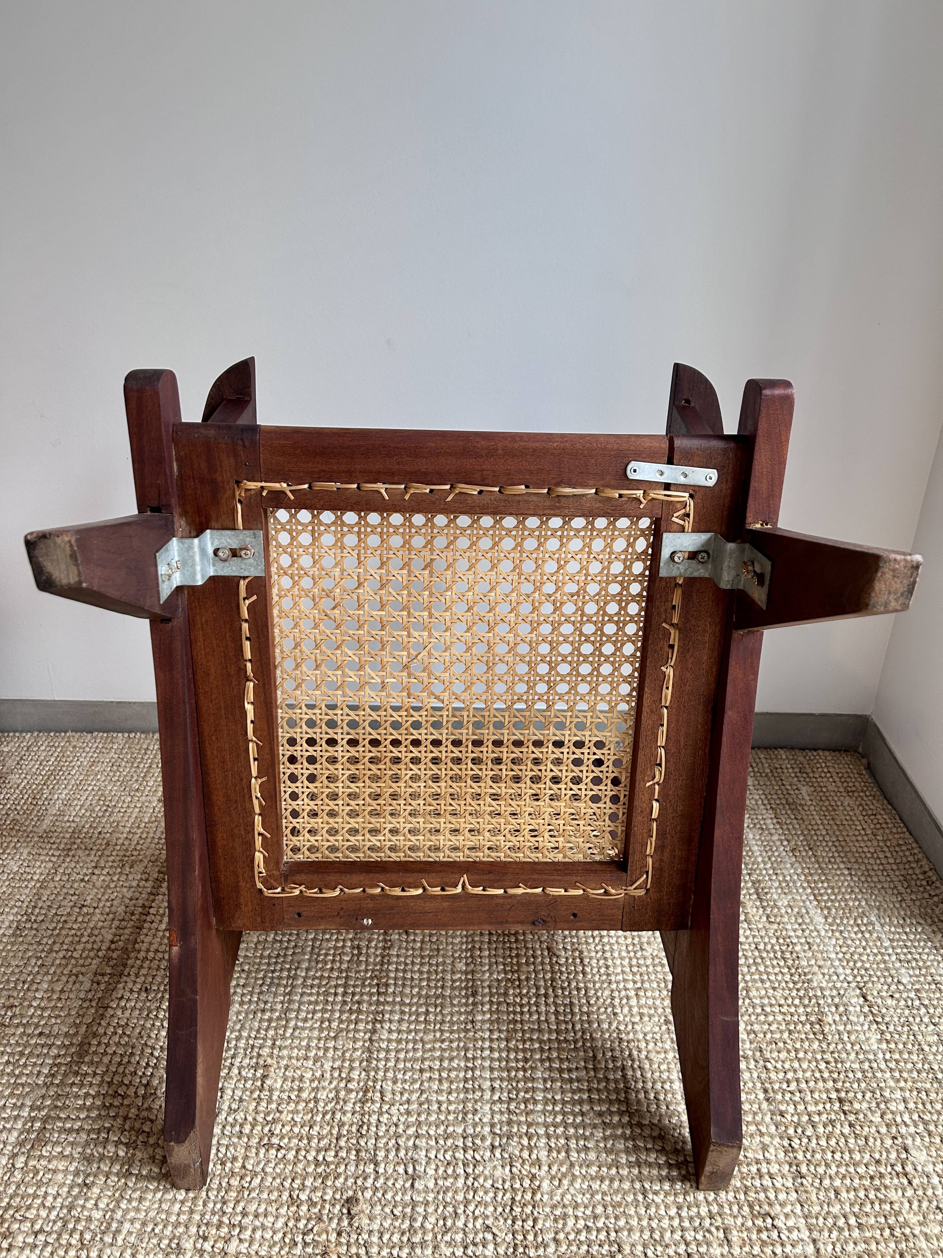 Reconstruction armchair in teak and caning