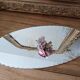 Vintage chiseled bevelled mirror under oval velvet