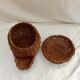 Wicker and rattan basket dispenser with lid