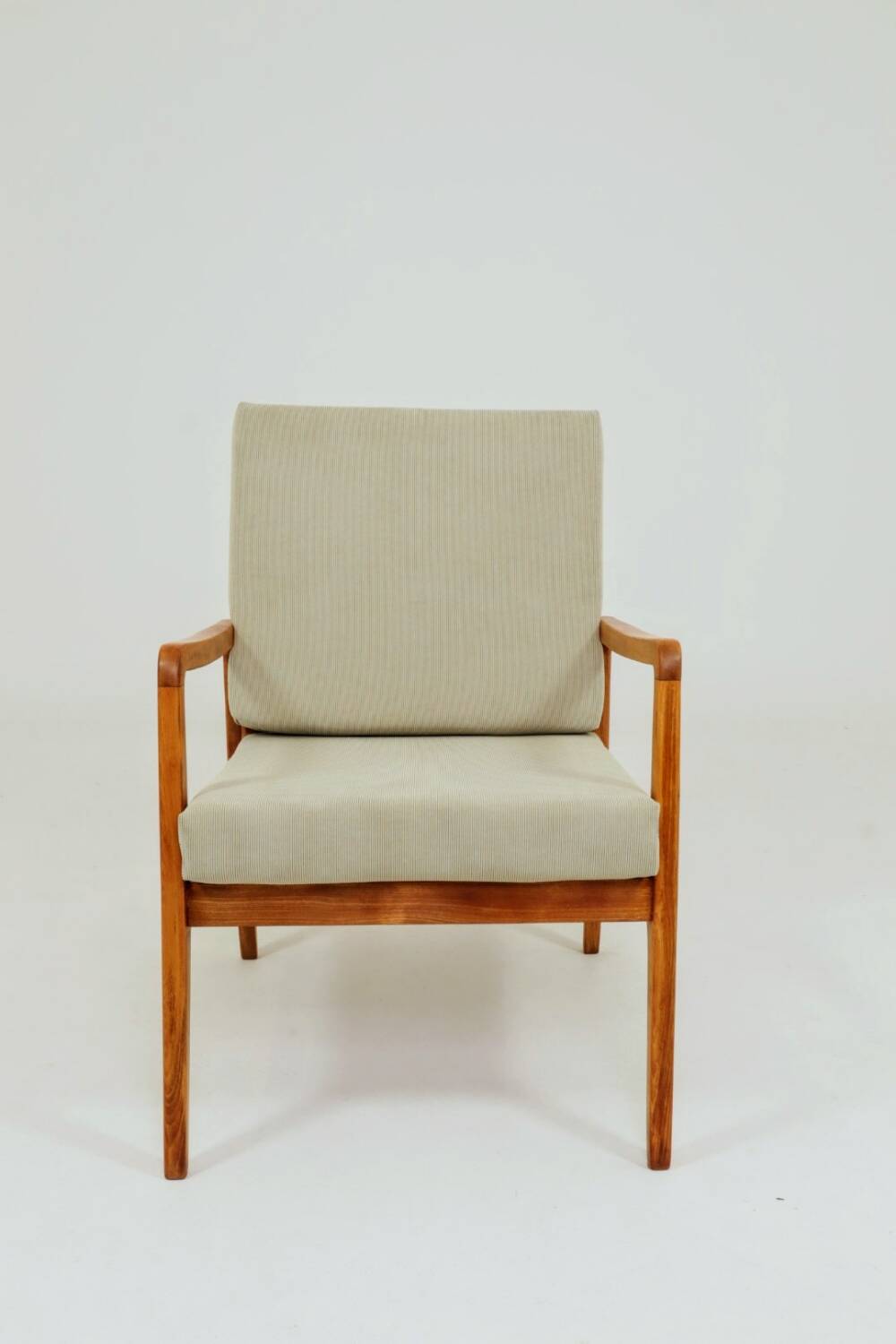 Vintage armchair in khaki corduroy, mid-century modern design from the 1960s.