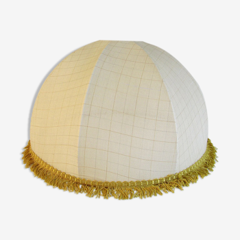 Cloth suspension with gold fringe