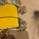 Ornamental brass mirror