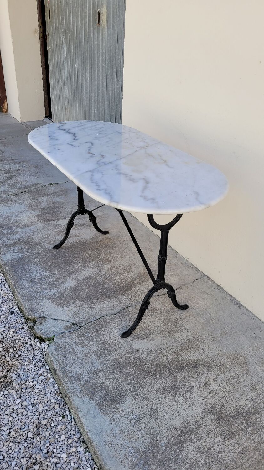 Cast iron bistro table and old oval marble top