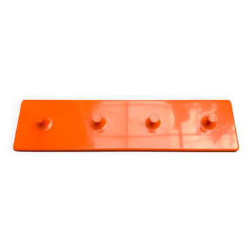 Orange coat rack from the mid-century space age, 1960s.