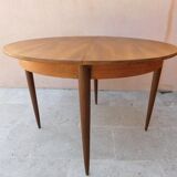 Table ronde rallonge intégrée