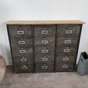 Metal furniture with 15 renovated roneo flaps.
