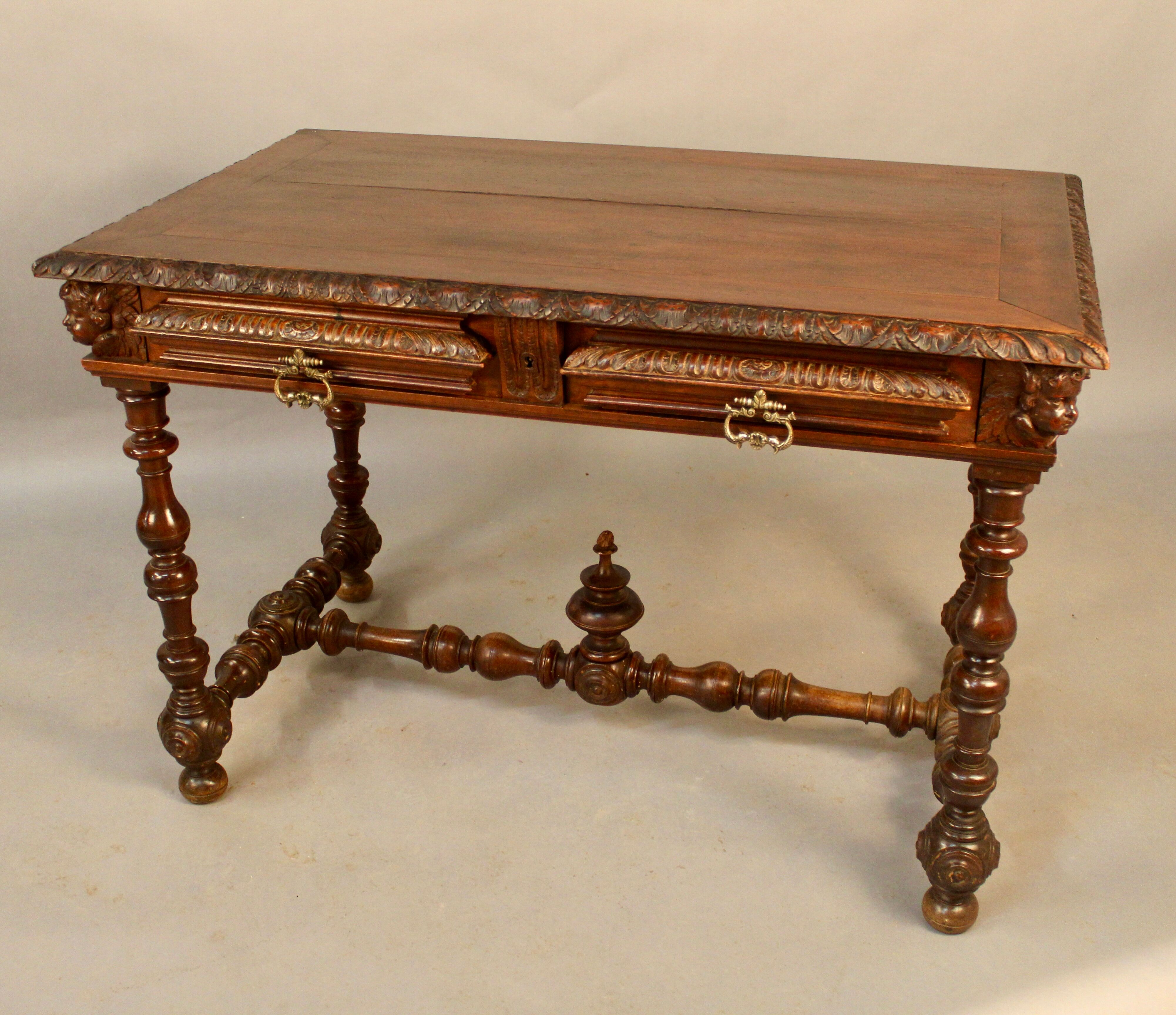 Louis XIII style writing table with Putti decoration