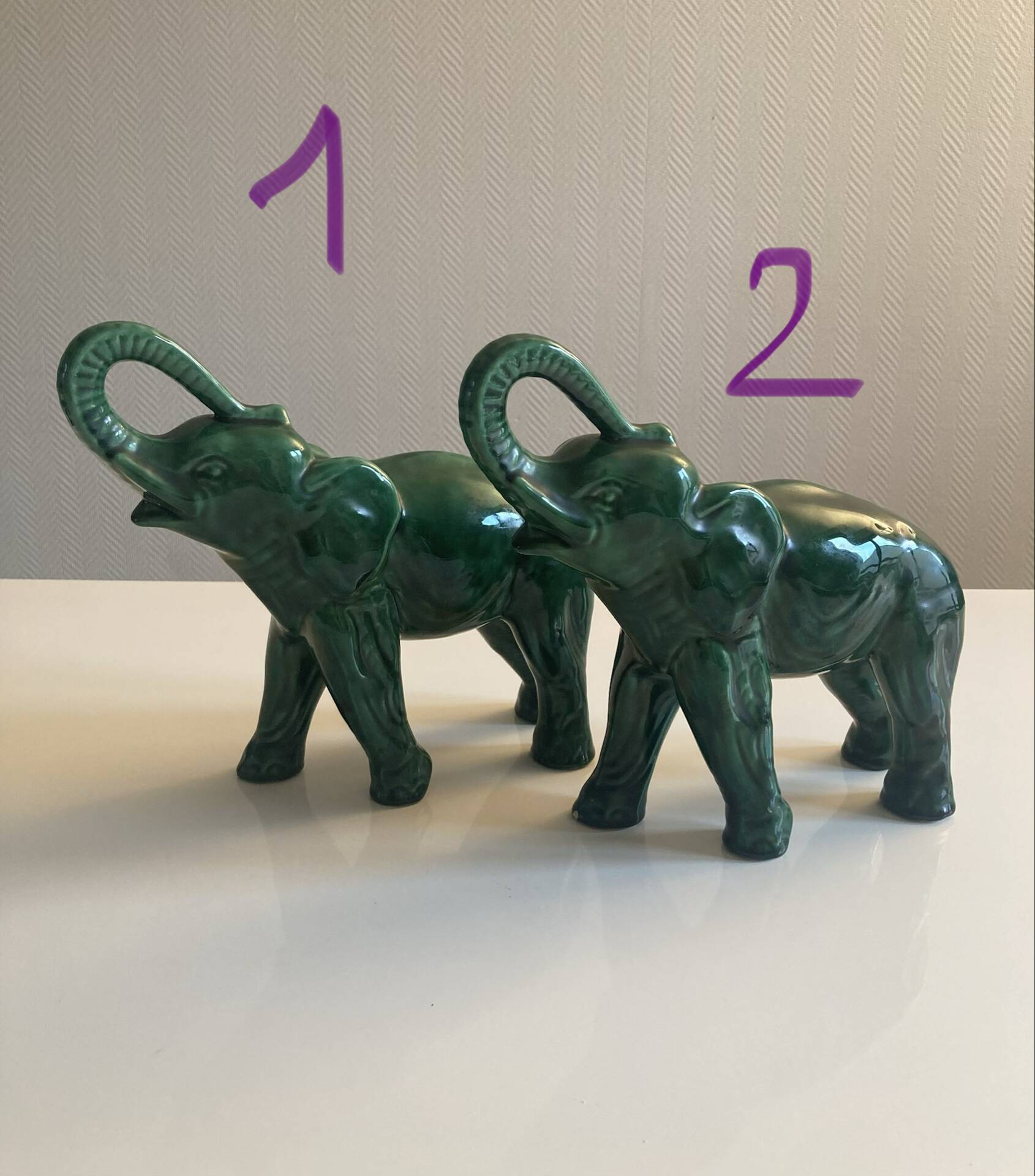 Pair of marbled faience elephants from Saint Clément