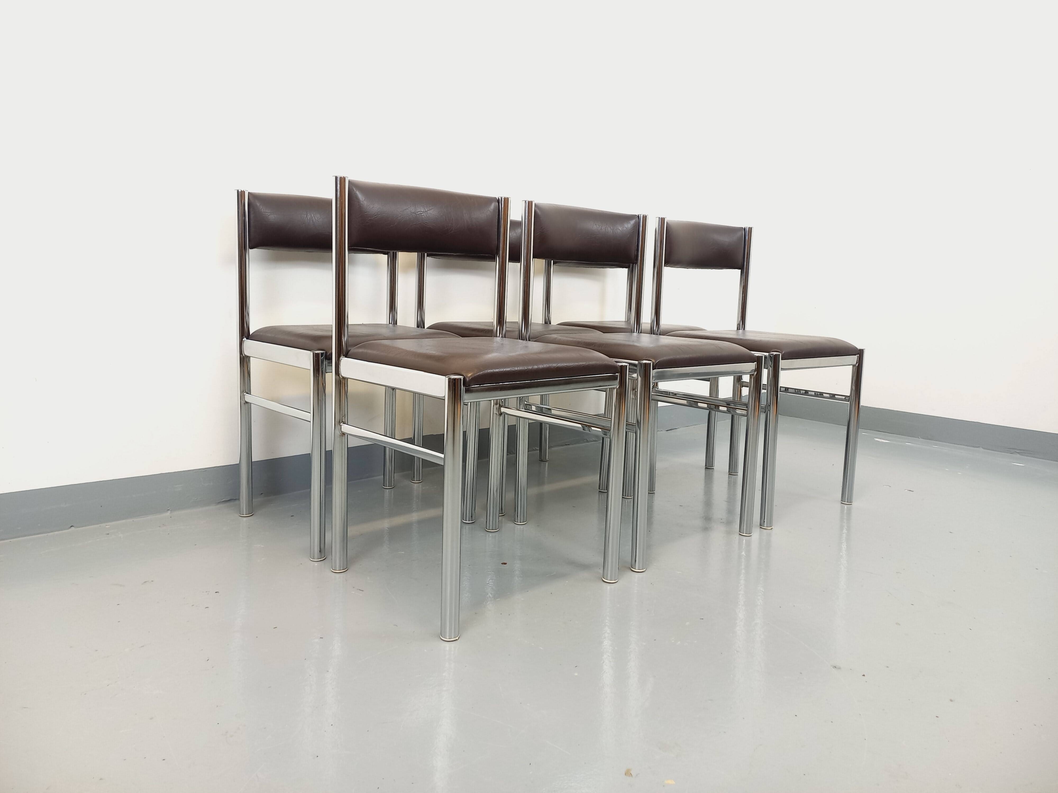 Set of 6 vintage chairs from the 70s in chrome metal and brown faux leather.