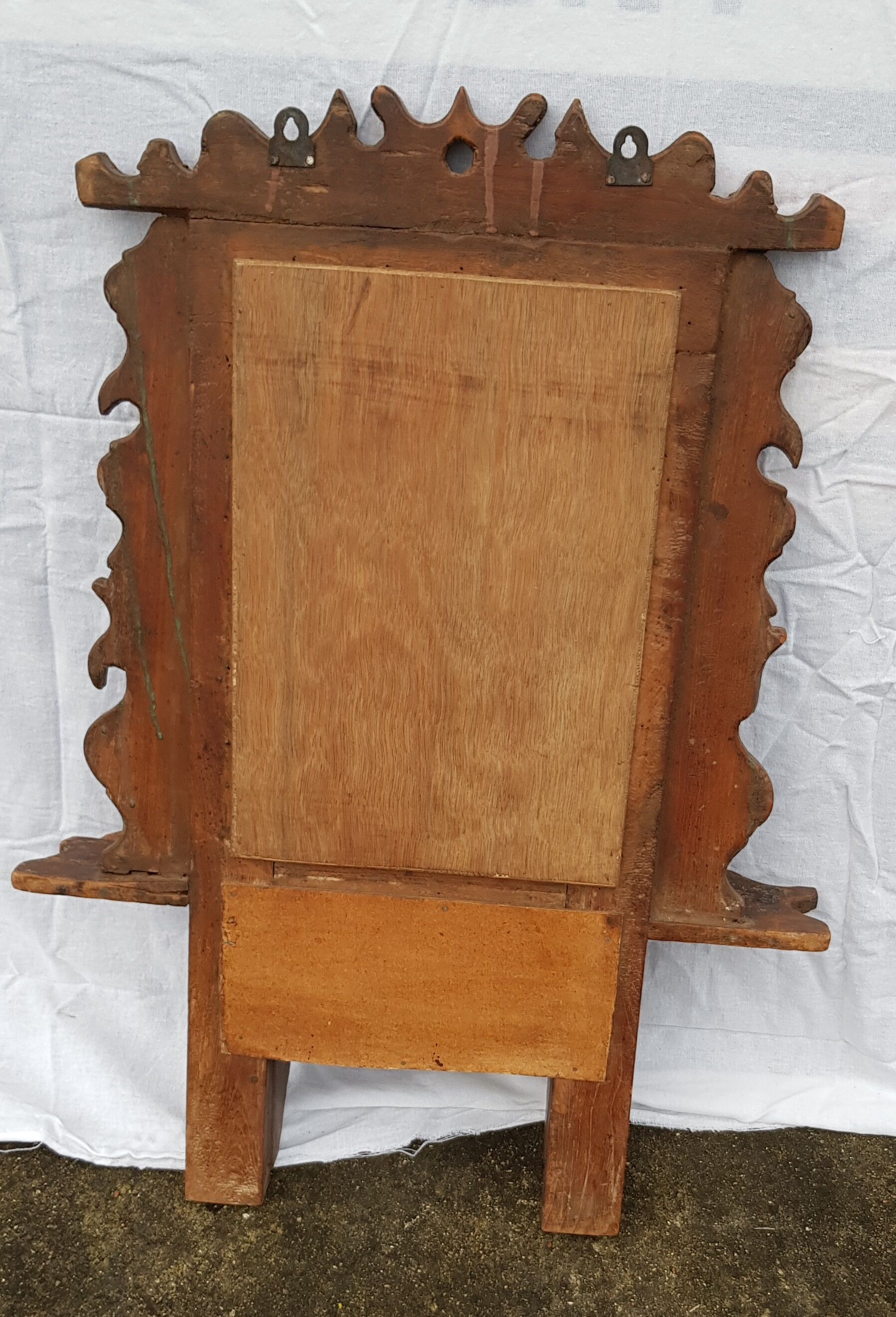 Old barber's mirror in teak