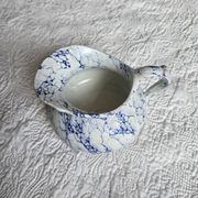 Pot à lait en porcelaine de Limoges décor bleu marbré