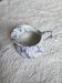 Porcelain milk jug from Limoges with a marbled blue design.