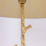 Pair of gilded metal floor lamps. 20th century.