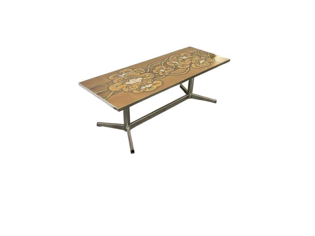 Vintage ceramic coffee table with a chrome frame.