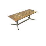 Vintage ceramic coffee table with a chrome frame.