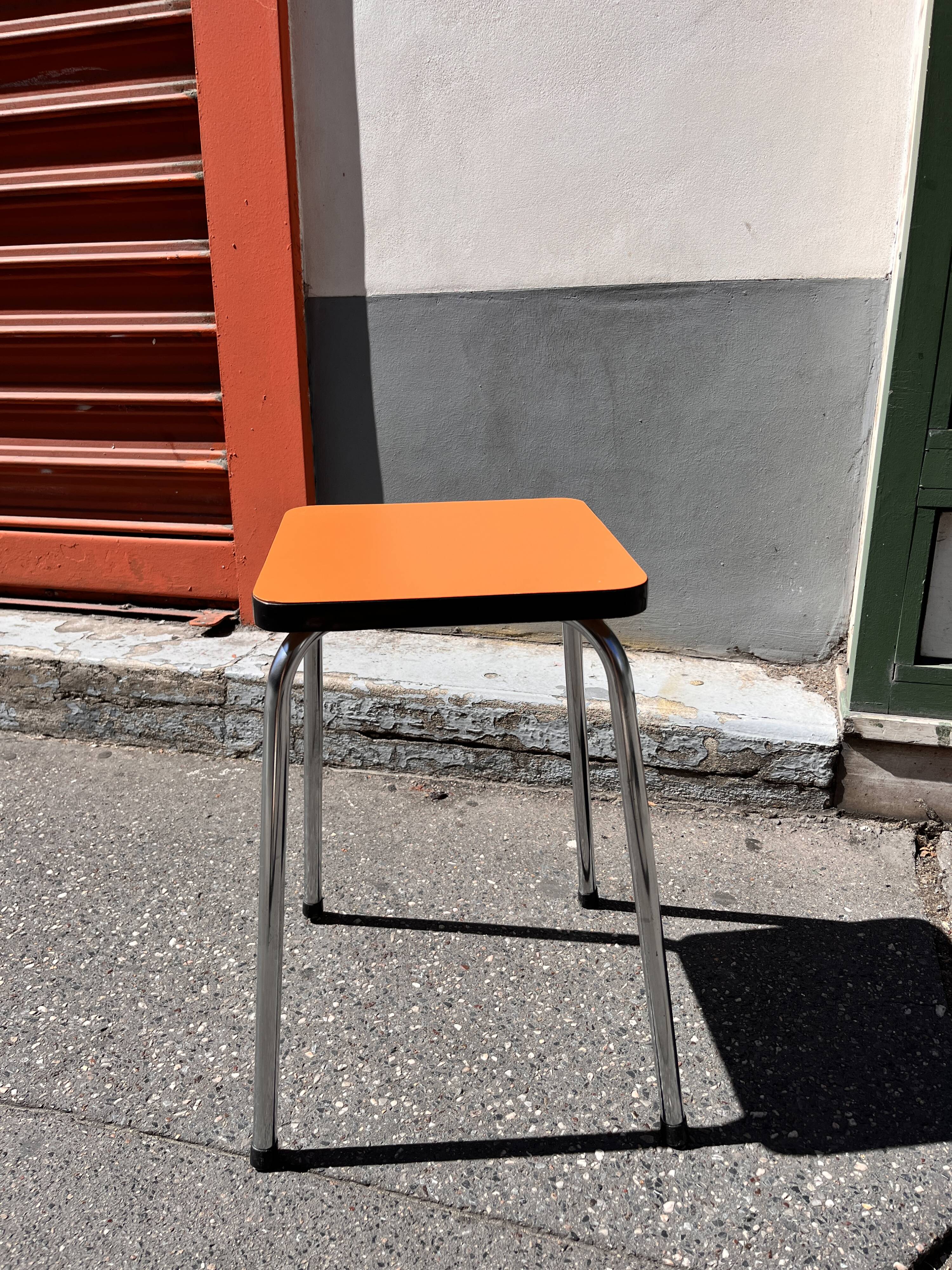 Orange Formica stool