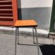 Orange Formica stool