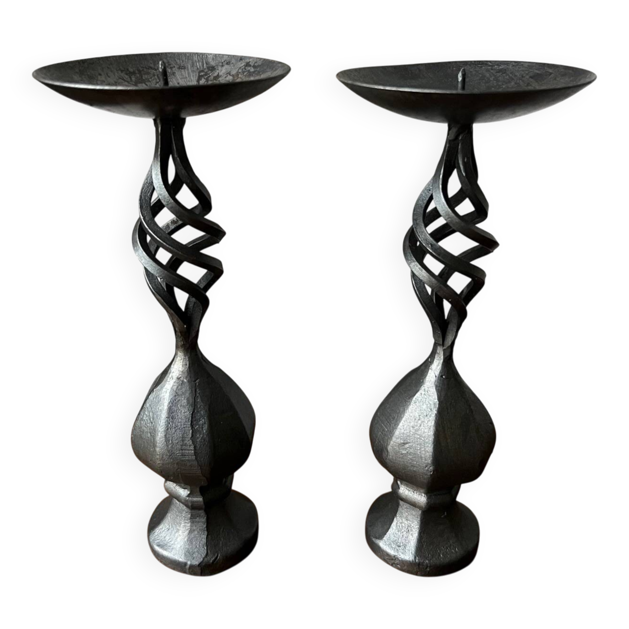 Pair of wrought iron candlesticks, black patina