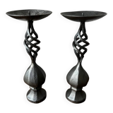 Pair of wrought iron candlesticks, black patina