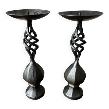 Pair of wrought iron candlesticks, black patina