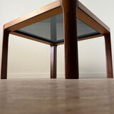 Square wooden coffee table with glass.