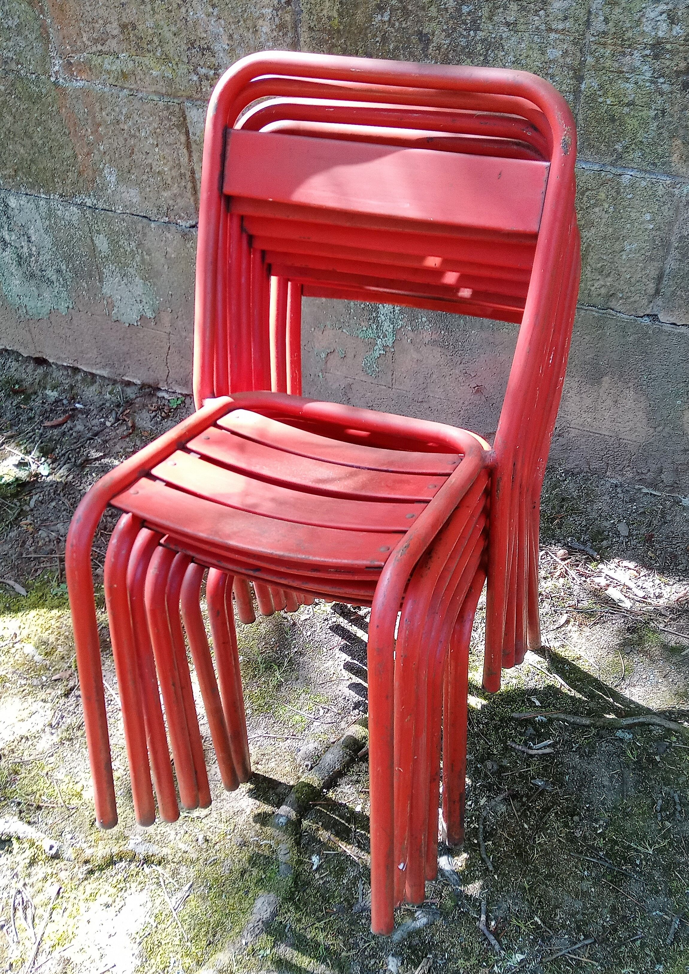 Series of 8 red Tolix chairs