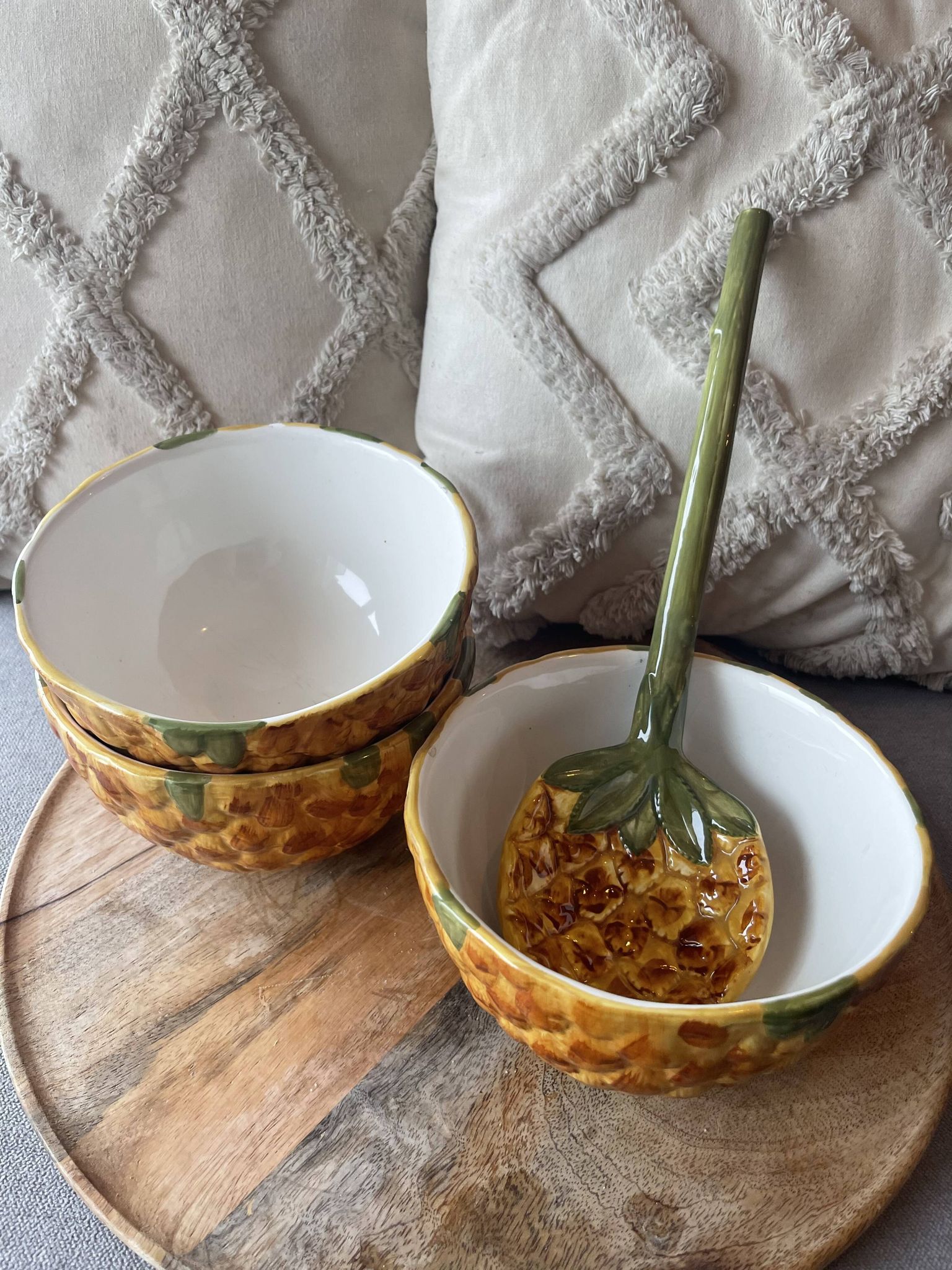 Old set of bowls and spoons in the shape of vintage pineapple