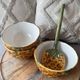 Old set of bowls and spoons in the shape of vintage pineapple