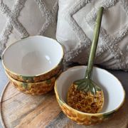 Old set of bowls and spoons in the shape of vintage pineapple