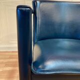 Set of 3 designer leather and metal armchairs.