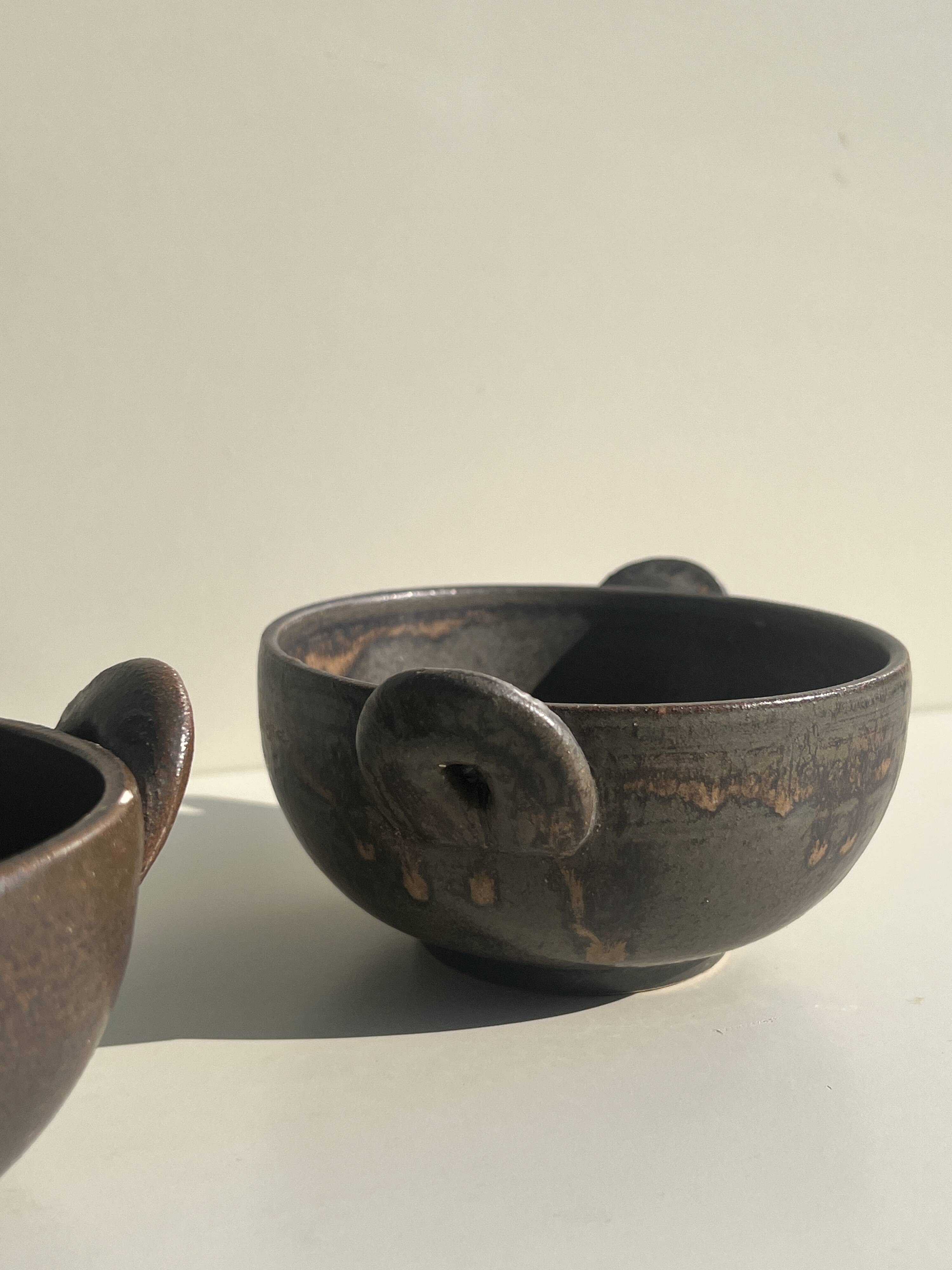 Pair of 2 handmade stoneware bowls, 20th century